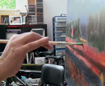 Al Currier painting in studio